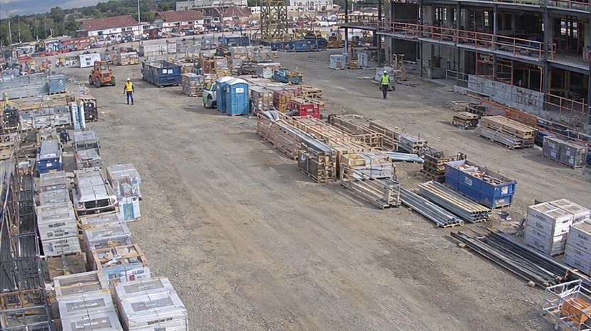 Elevated site camera overview showing repeated staging blockages